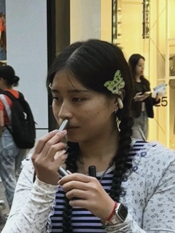 Inhale Club customer using a nasal inhaler