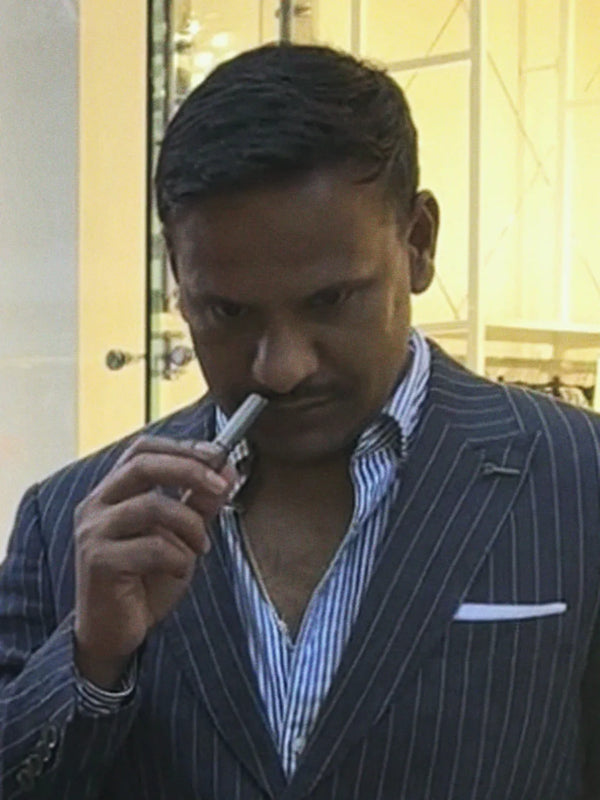 Inhale Club customer using a nasal inhaler