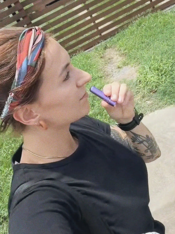 Inhale Club customer using a nasal inhaler