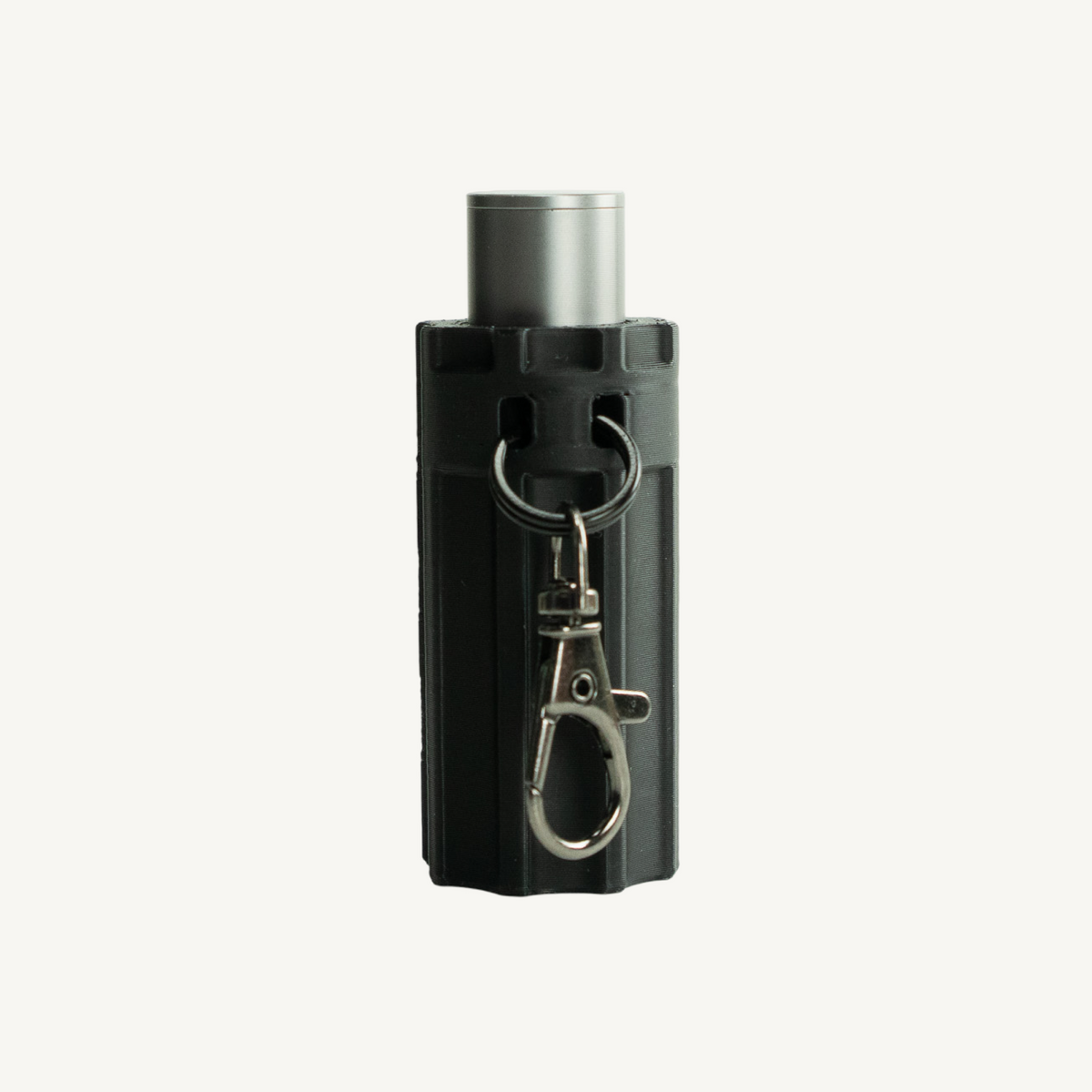 KeySleeve Charcoal, Flute style, on an inhaler with clip