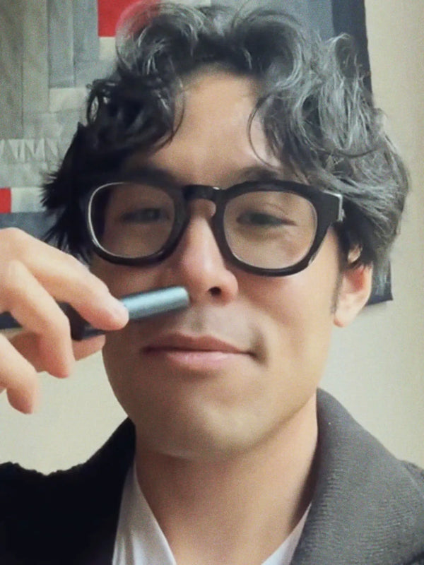 Inhale Club customer using a nasal inhaler