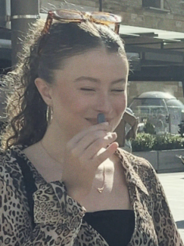 Inhale Club customer using a nasal inhaler