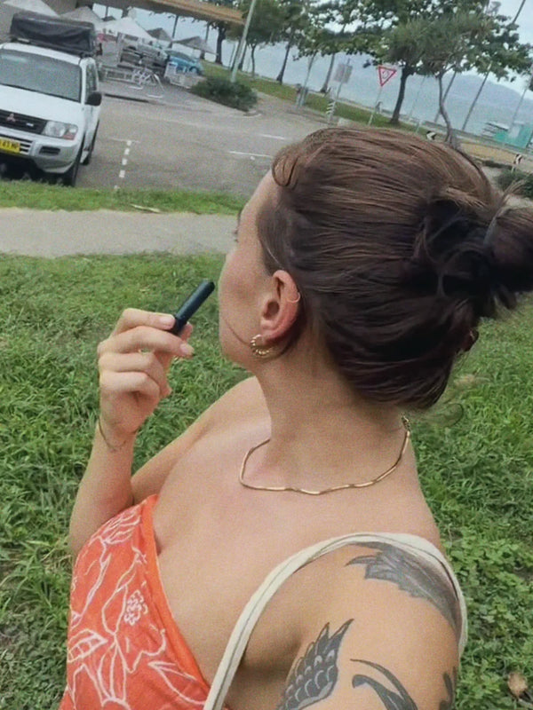 Inhale Club customer using a nasal inhaler